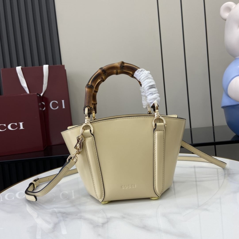 G*u*i top handle bags